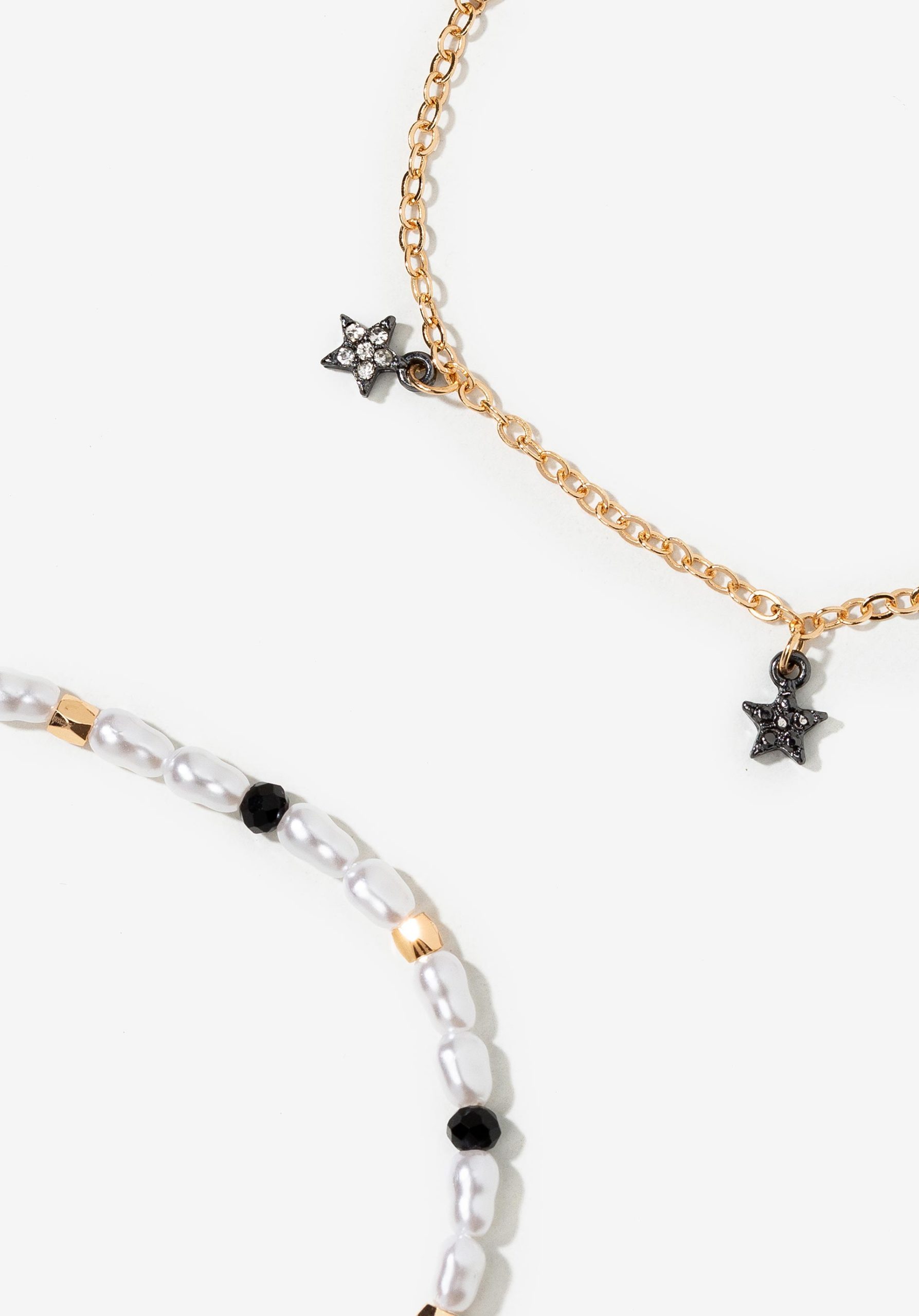 Pack de dos pulseras de perlas y estrellas, modelo 71006877 de Vilanova.