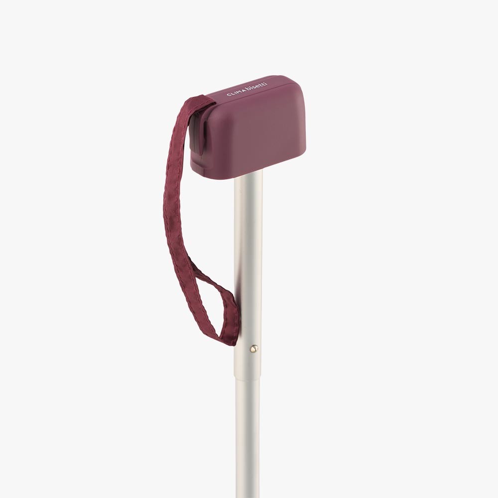Mini paraguas plegable Clima en color burdeos con funda a juego y diseño compacto.