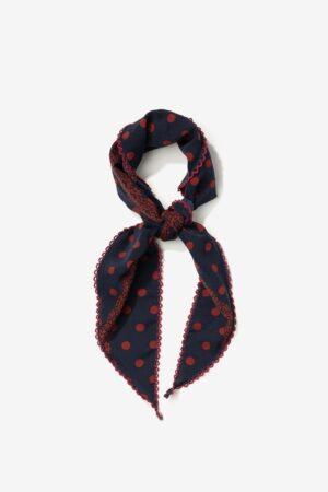 Bandana Vilanova azul marino con lunares rojos y borde ondulado