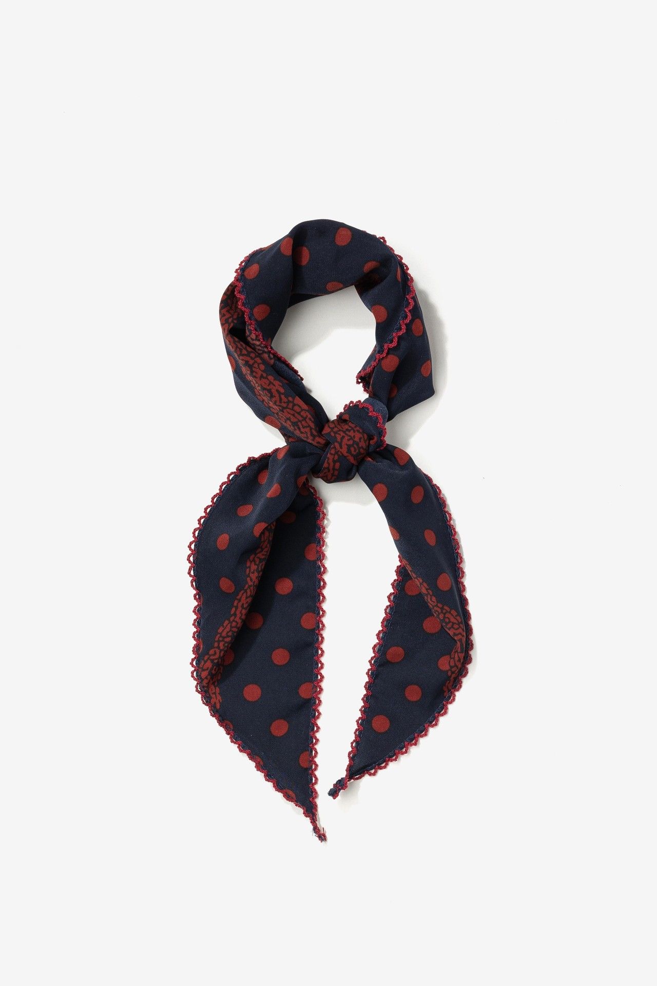 Bandana Vilanova azul marino con lunares rojos y borde ondulado